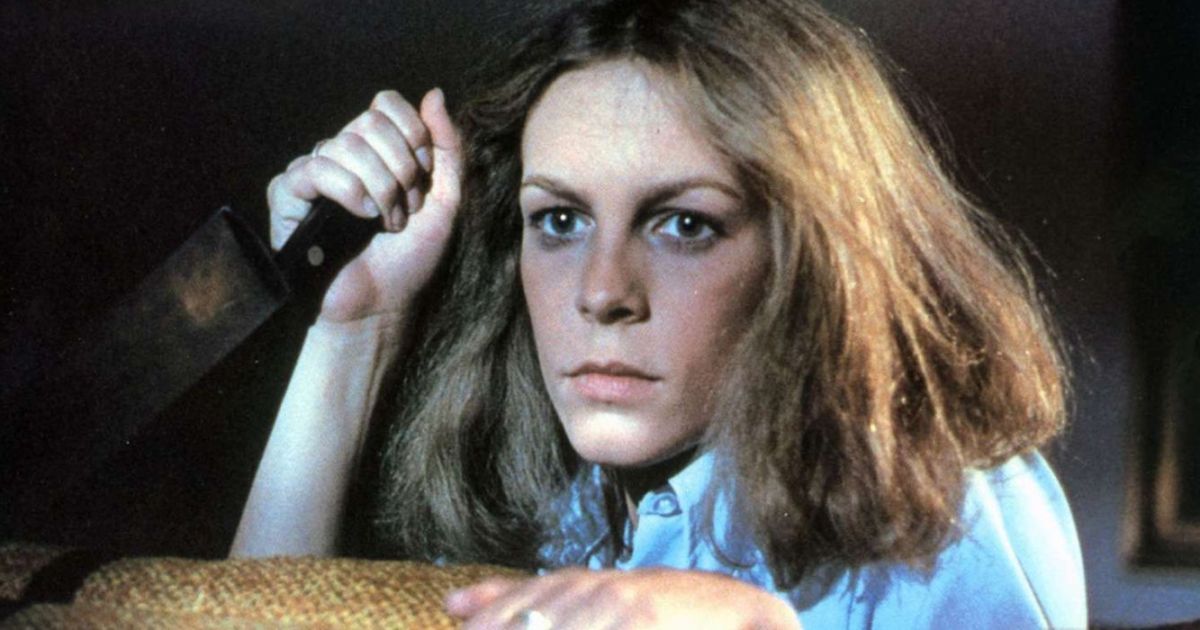 Jamie Lee Curtis holds a knife in Halloween