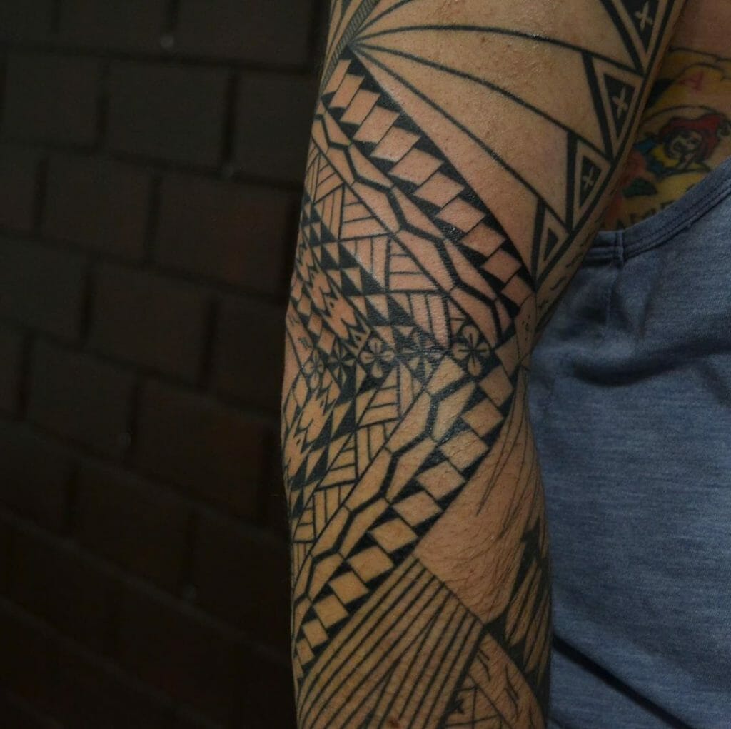 Mens’ tribal tattoo elbow Tattoo Ideas