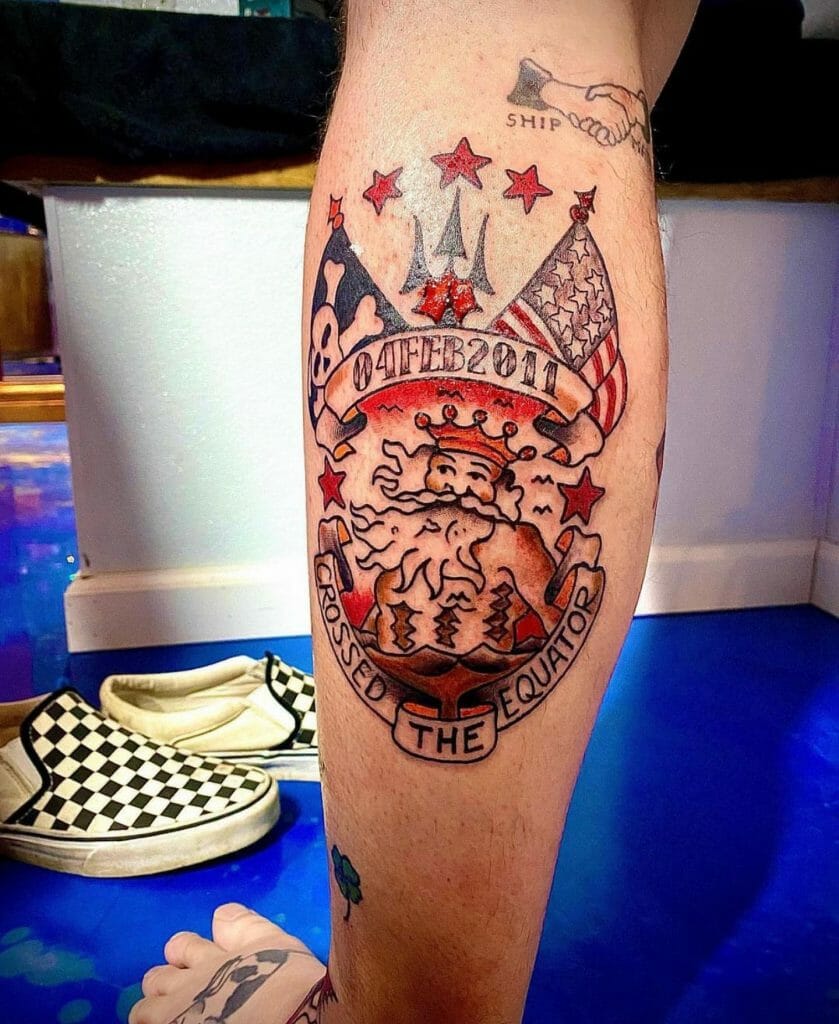 Colorful tattoo commemorating crossing the equator, featuring King Neptune, a trident, an American flag, and the date 04 FEB 2011