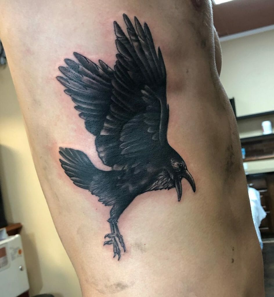 Rib tattoo bird