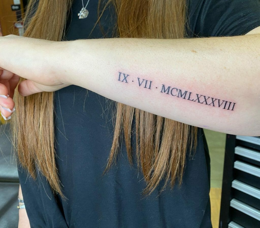 Roman Numerals Tattoo on Arm's Underside ideas