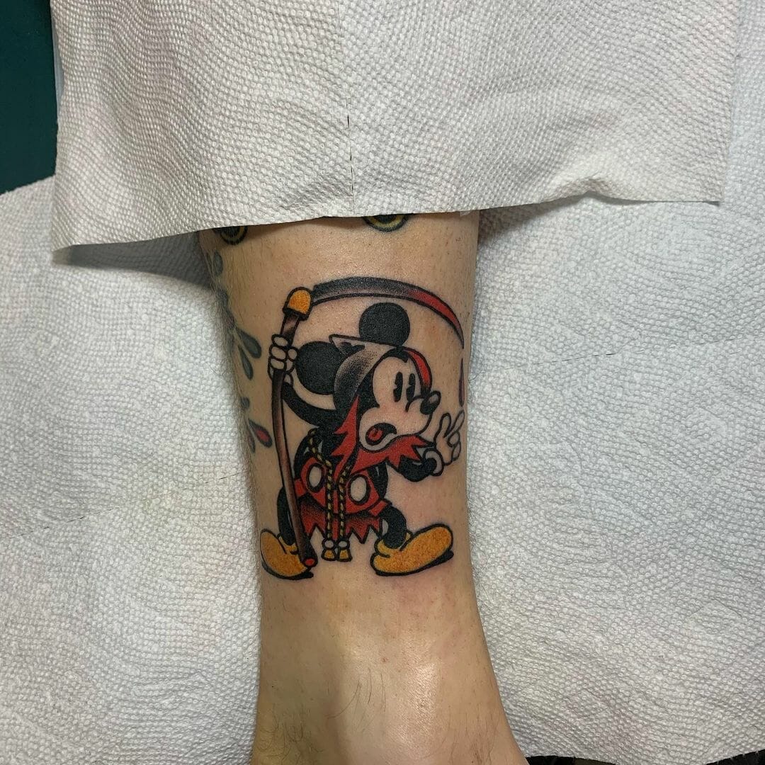 Small Mickey Mouse Tattoo On Leg