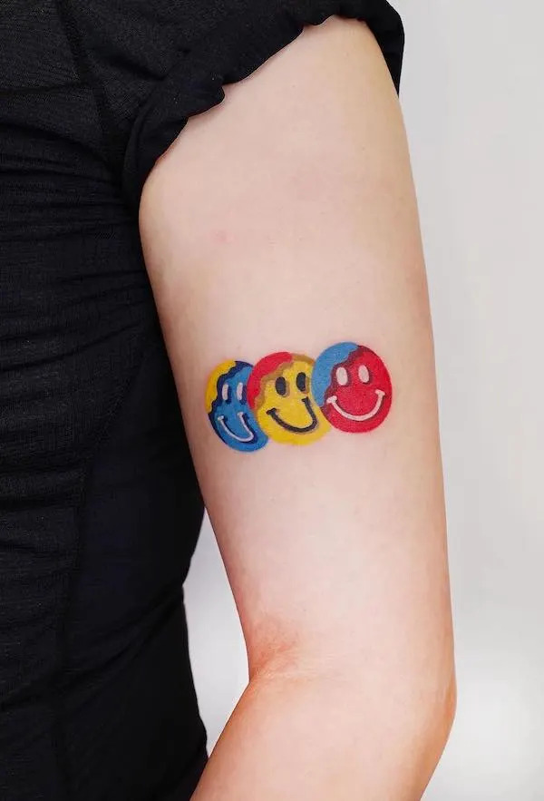 Smiley faces upper arm tattoo by zoonmo .jpg Tattoo Ideas