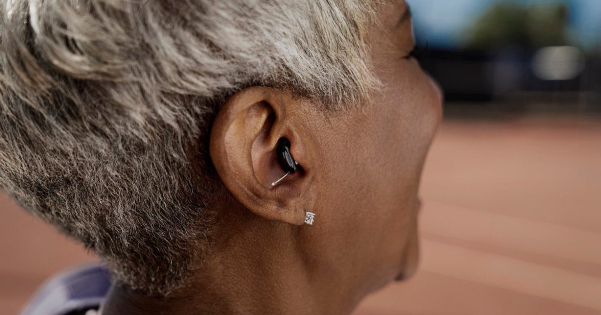 Woman wearing Sony Self Fitting OTC Hearing Aids