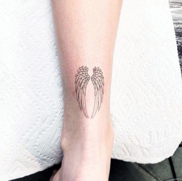 Tiny Angel Wings Tattoo