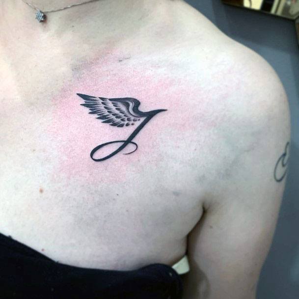 Tiny Angel Wings Tattoo