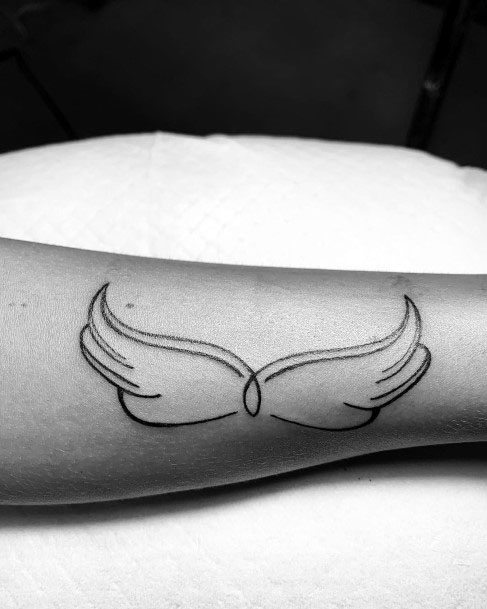 Tiny Angel Wings Tattoo