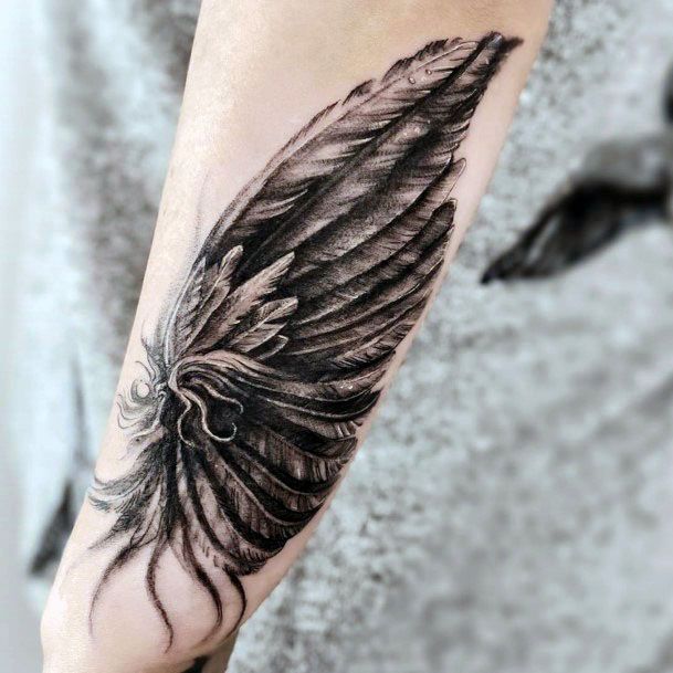 Tiny Angel Wings Tattoo