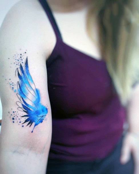 Tiny Angel Wings Tattoo