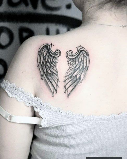 Tiny Angel Wings Tattoo