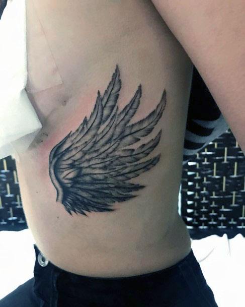 Tiny Angel Wings Tattoo