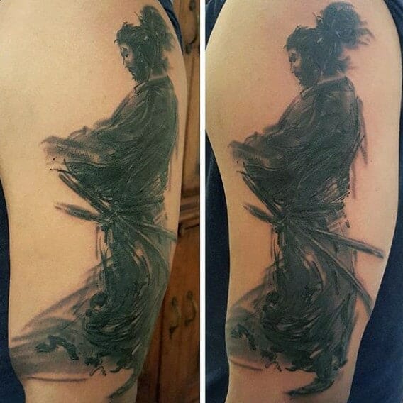 Ink brush style tattoo of a samurai on upper arm with a traditional Japanese art influence