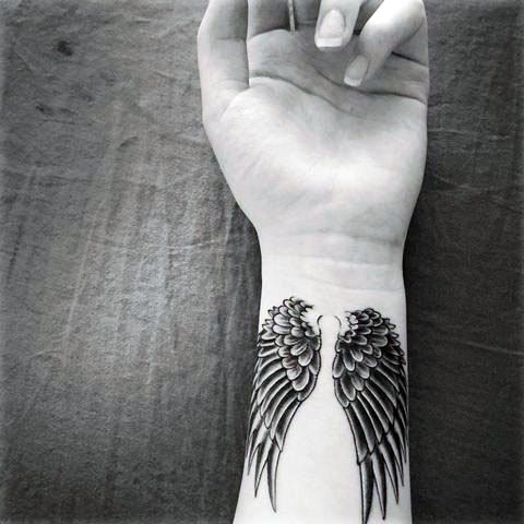 Tiny Angel Wings Tattoo