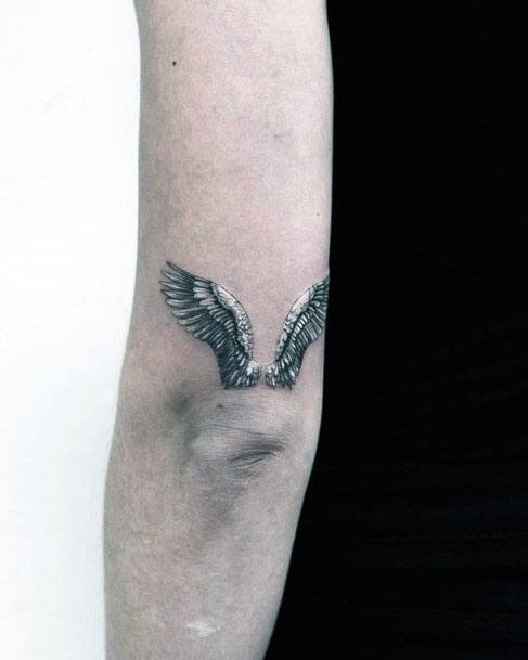 Tiny Angel Wings Tattoo