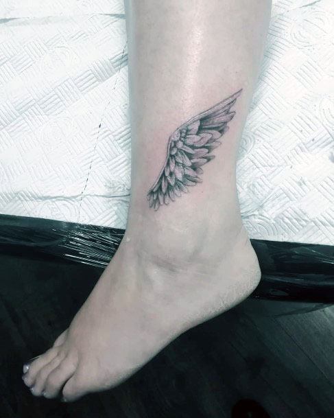 Tiny Angel Wings Tattoo