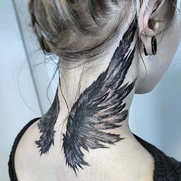 Tiny Angel Wings Tattoo