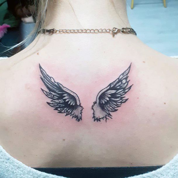 Tiny Angel Wings Tattoo