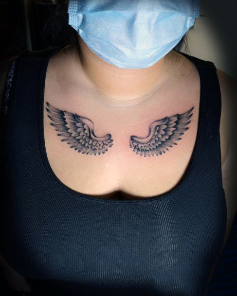 Tiny Angel Wings Tattoo