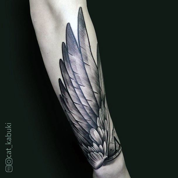 Tiny Angel Wings Tattoo