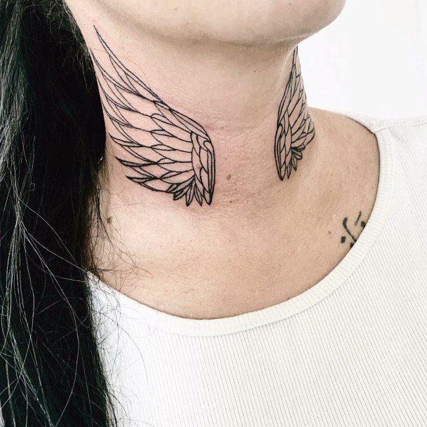 Tiny Angel Wings Tattoo