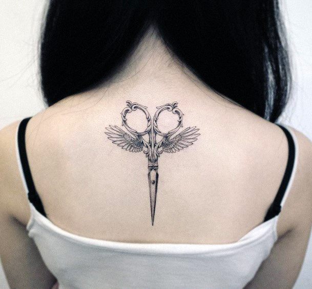 Tiny Angel Wings Tattoo