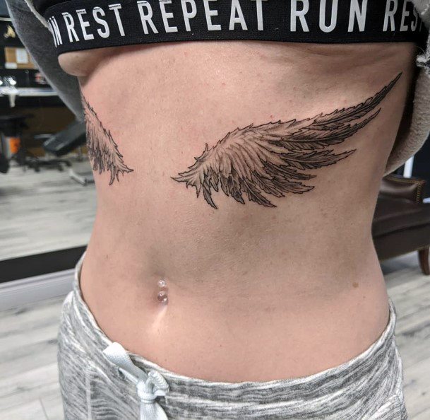 Tiny Angel Wings Tattoo