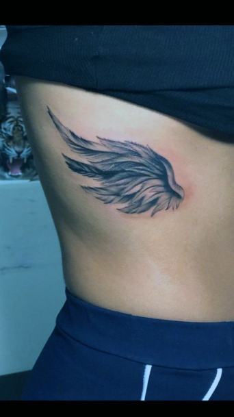 Tiny Angel Wings Tattoo