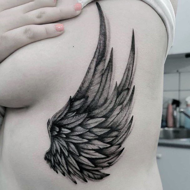 Tiny Angel Wings Tattoo