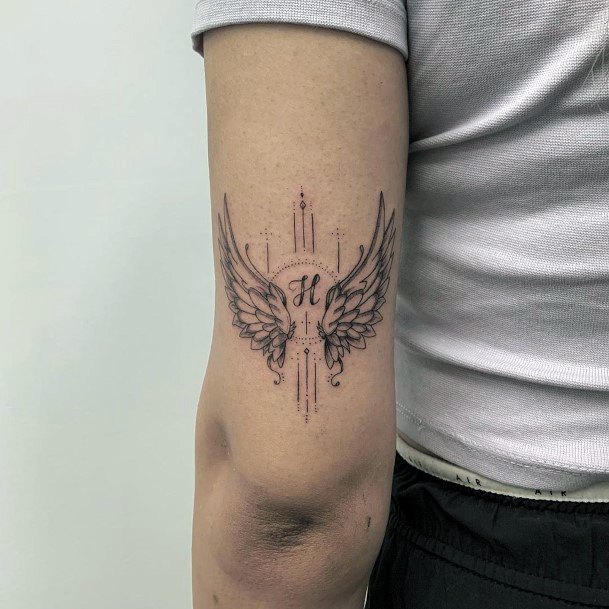 Tiny Angel Wings Tattoo