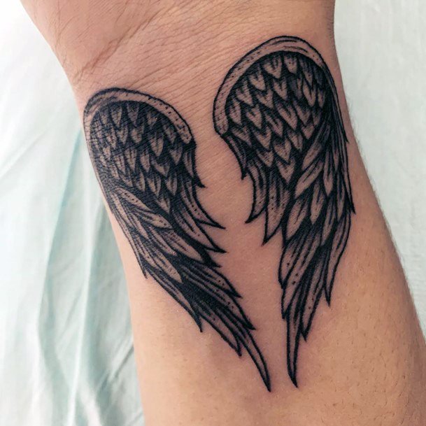 Tiny Angel Wings Tattoo