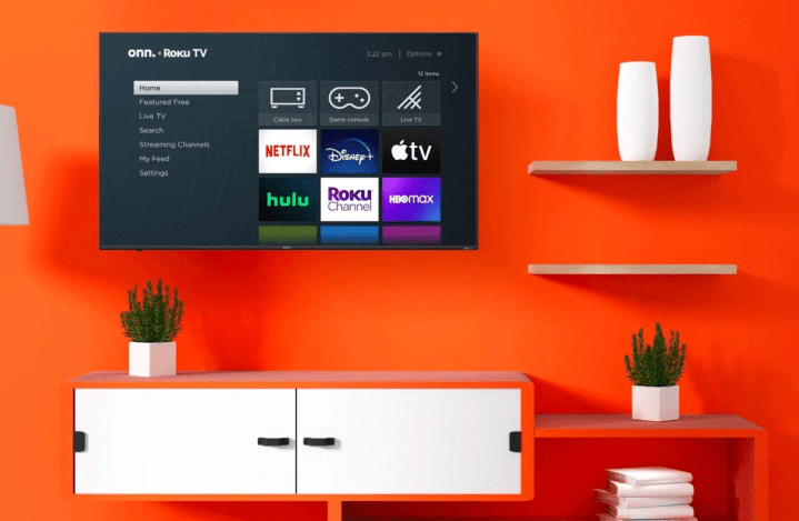 ONN. A 70-inch 4K Roku TV hangs on the wall as part of a home theater arrangement.