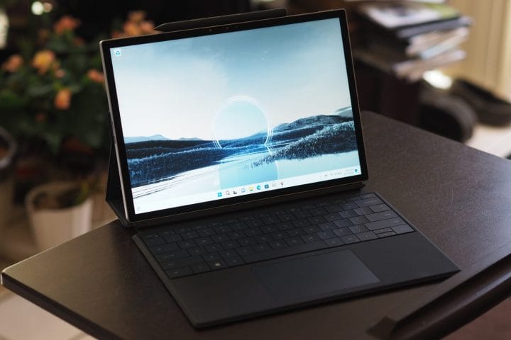 Dell XPS 13 2-in-1 showing front angled view display and folio keyboard.