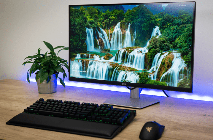 27-inch Dell S2721QS 4K monitor on a table.