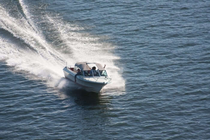 Hopping on the boat ride in the park