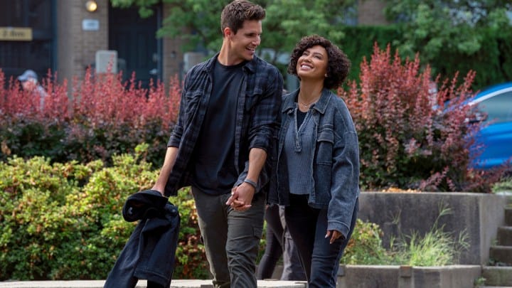 A scene in the upload shows Nathan and Nora hanging out in the real world, smiling and laughing.