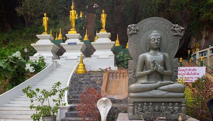 The statues of Lord Buddha on the premises of Tiger Cave Temple