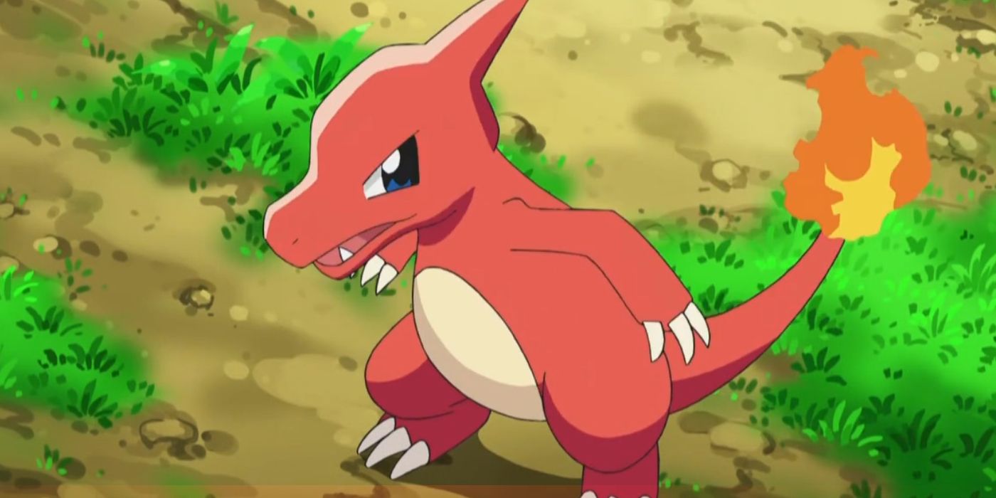 Ash's Charmeleon standing in a field with its arms out and a defiant look on its face.