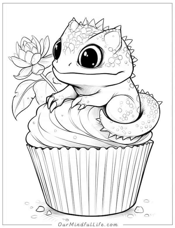 Baby lizard on a cupcake coloring page