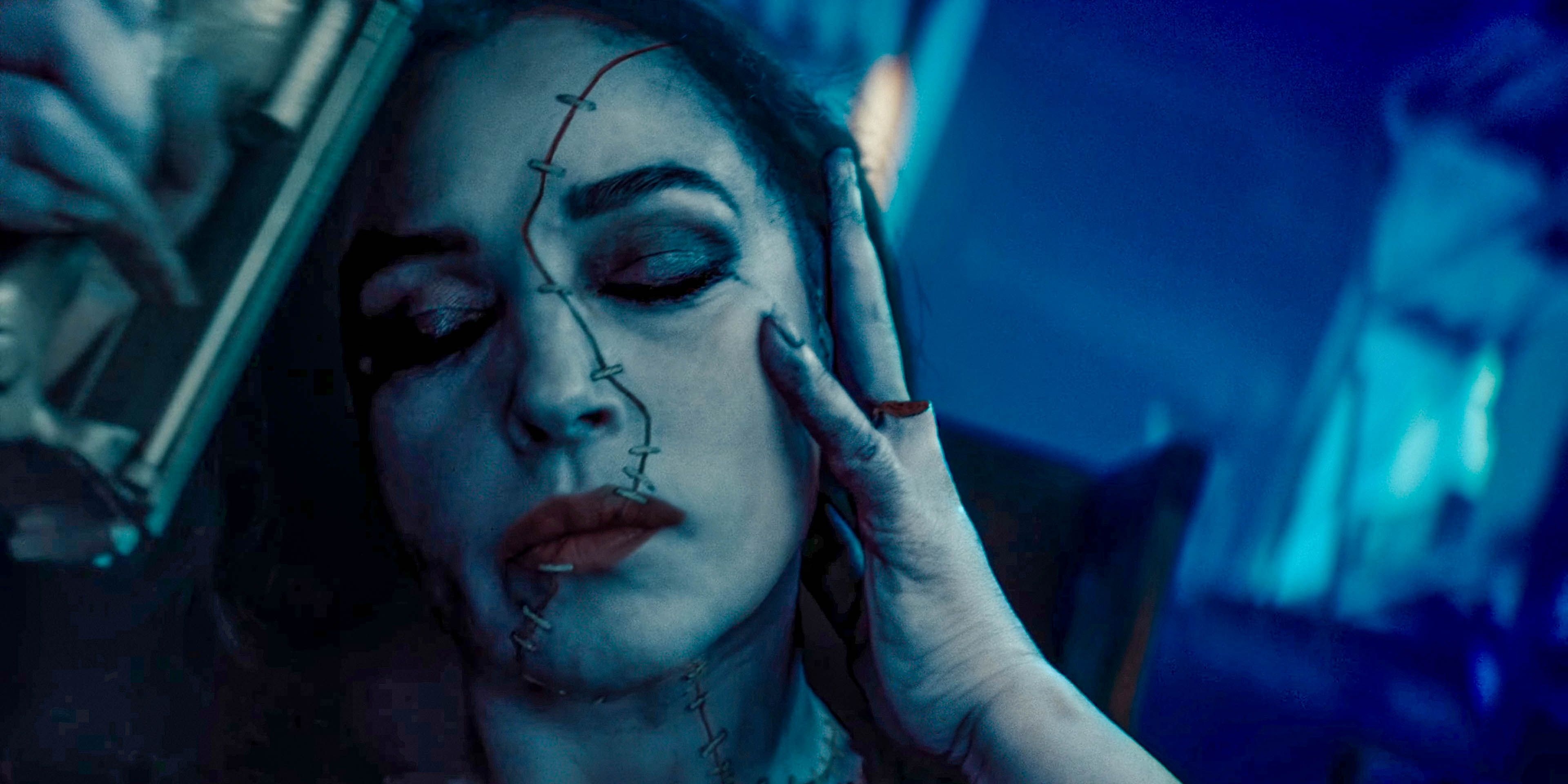 Delores (Monica Bellucci) with the skin of her face stapled in Beetlejuice Beetlejuice