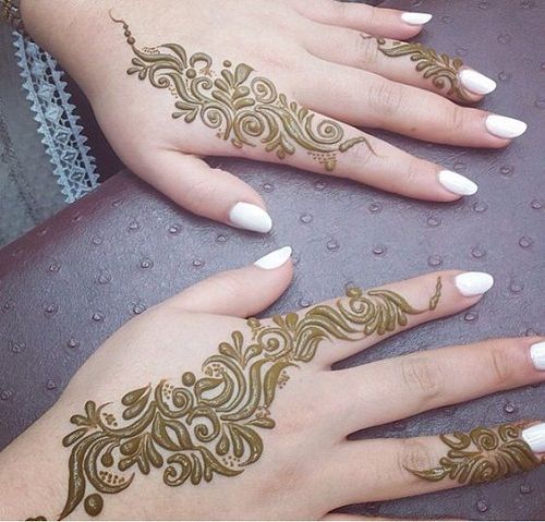 Simple Arabic Mehndi design with flowing floral and leaf motifs across the back of both hands, perfect for casual and festive events