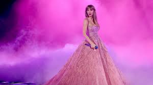 Taylor Swift performing "Enchanted" live in an elegant gown