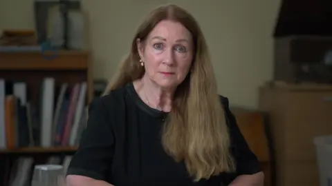 Solicitor Kathryn Yates at her desk