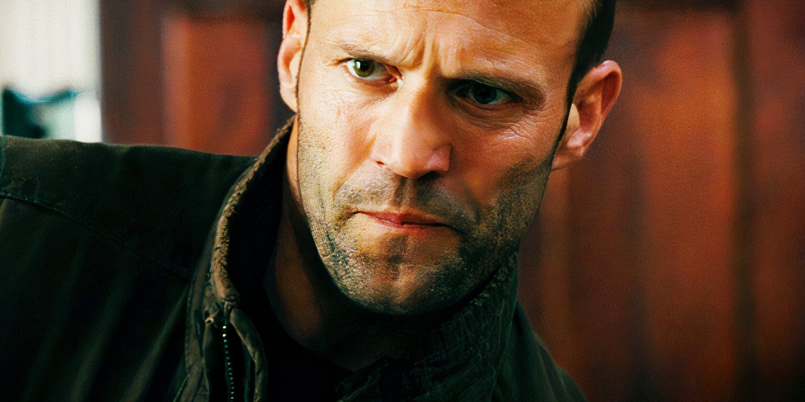 Jason Statham looking serious as Arthur Bishop in The Mechanic