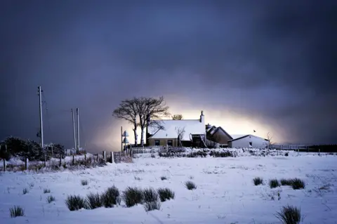 PA Media Snow and ice has been seen in Balmedie, Aberdeenshire.