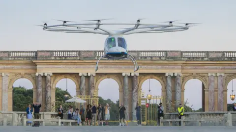 Volocopter Resembling a large drone, the two-seater VoloCity aircraft takes off at the Palace of Versaille