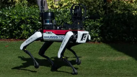 Reuters A futuristic-looking robotic dog made by Boston Dynamics patrols the grounds of President-elect Donald Trump's Florida residence