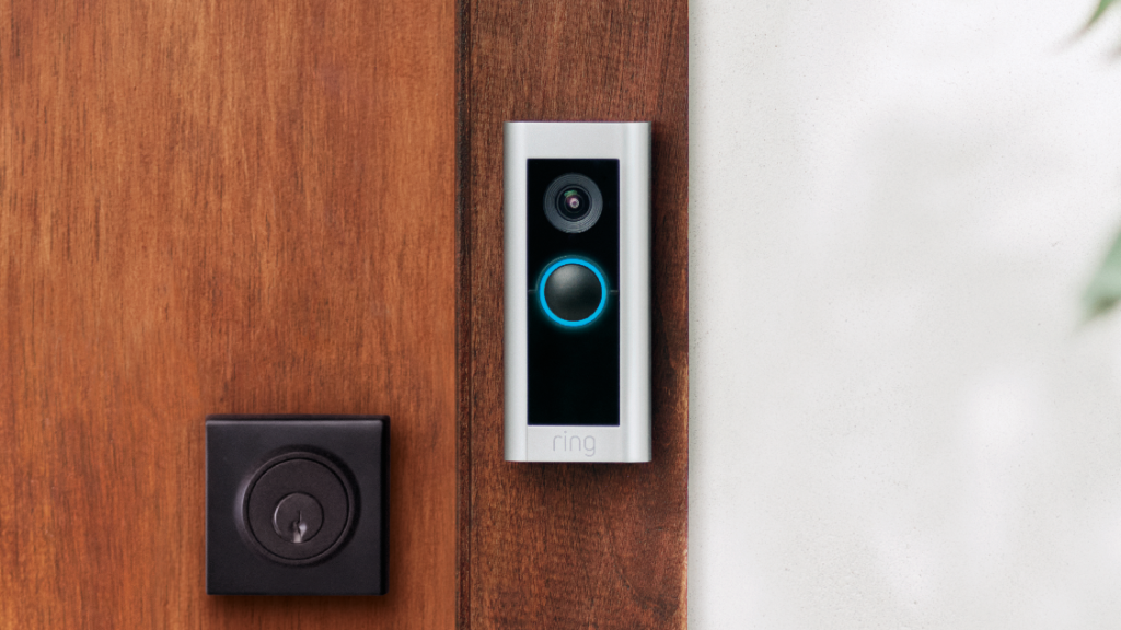 A Ring Video Doorbell Pro 2 mounted beside a front door, featuring a sleek design and advanced motion detection.